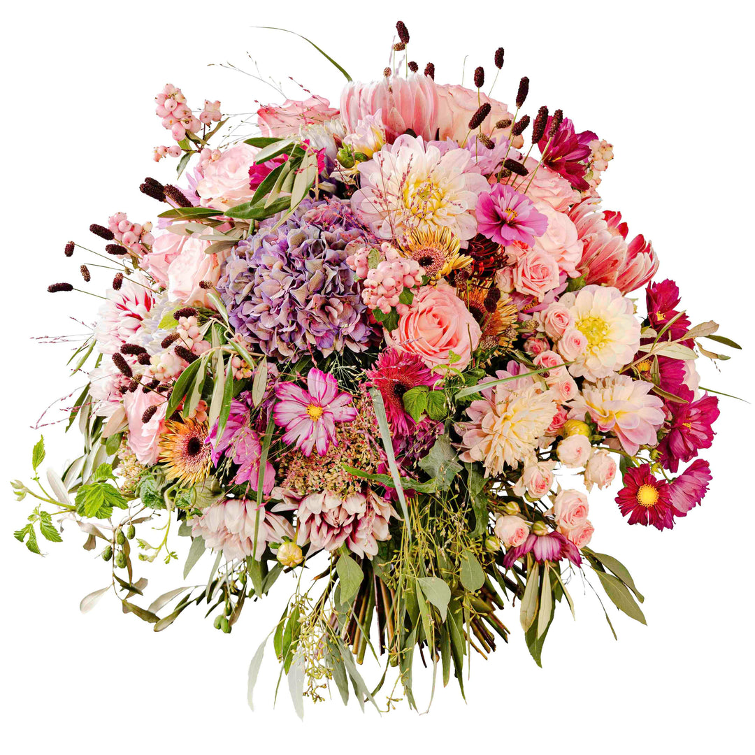 Dieser opulente Strauß spielt mit seiner großen Vielfalt an Farbe und Blumen. Eine solche üppige Pracht können nur unsere Floristenhände gesalten - handarbeit von Blumen Bahlmann Muenchen