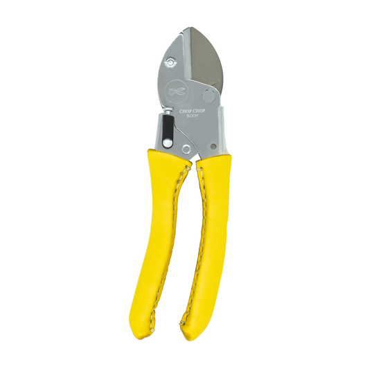 Hochwertige Chop Chop Bloom Gartenschere in Gelb mit scharfen Klingen und ergonomischem, handgenähtem Ledergriff für präzise Schnitte bei Blumen, Zweigen und Pflanzen im Garten und im Innenbereich. Blumen Bahlmann München