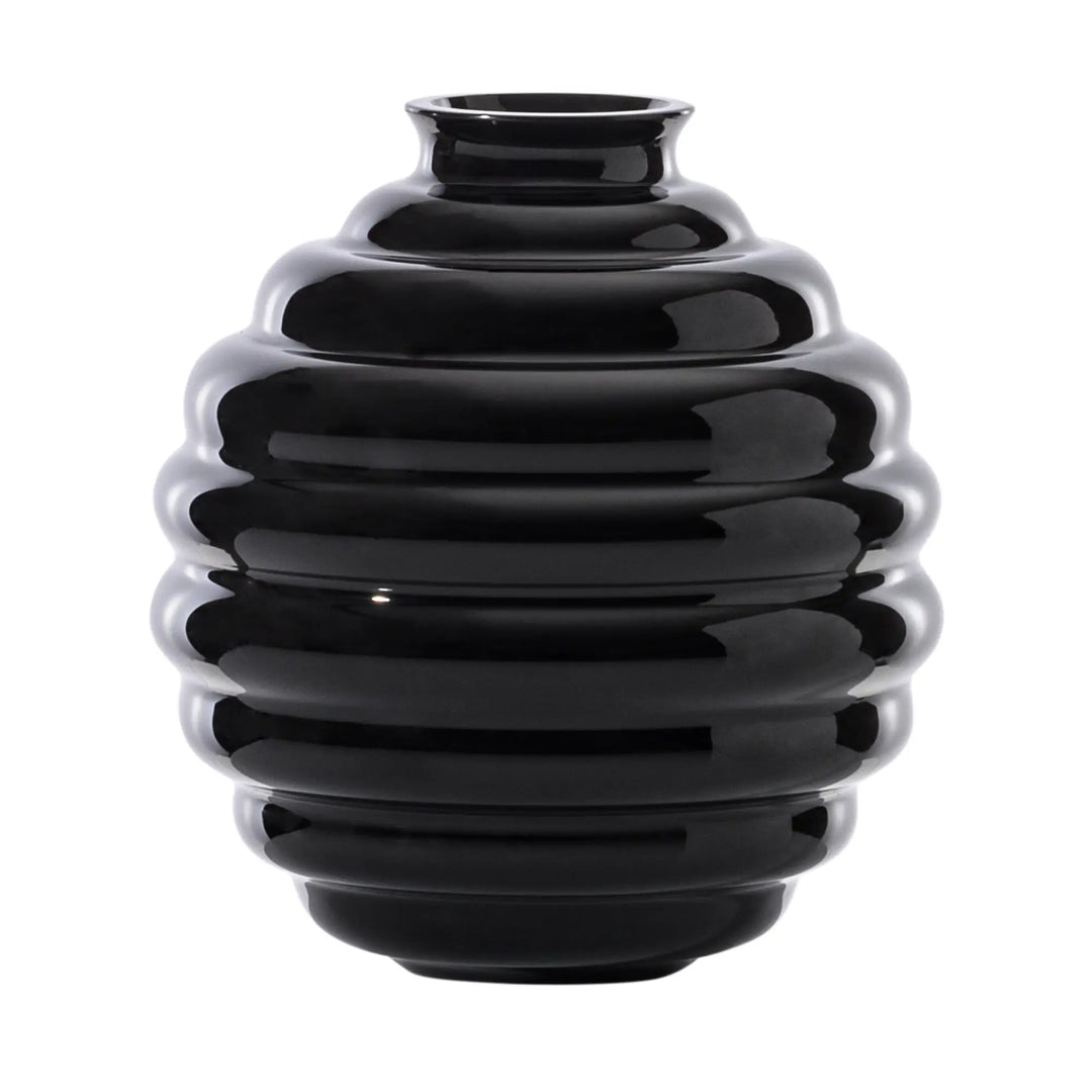 Venini Deco Vase aus mundgeblasenem Muranoglas mit charakteristischen, rhythmisch geschwungenen Ringformen und eleganter Silhouette. Blumen Bahlmann München.