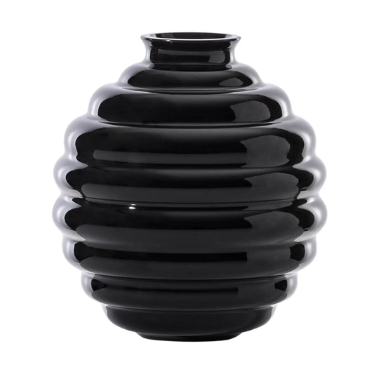 Venini Deco Vase aus mundgeblasenem Muranoglas mit charakteristischen, rhythmisch geschwungenen Ringformen und eleganter Silhouette. Blumen Bahlmann München.