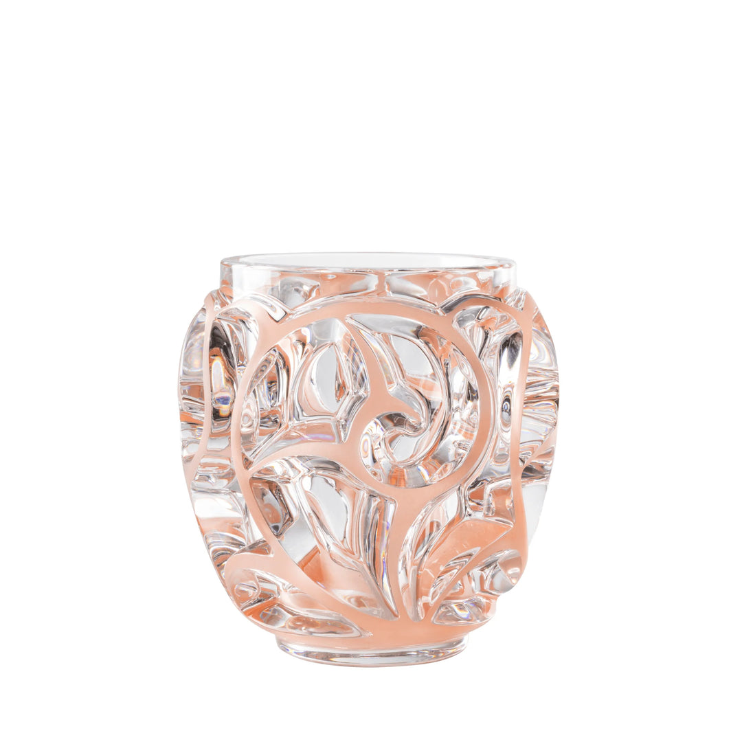 Lalique Tourbillons Vase aus klarem Kristall mit korallfarbener Patina und kunstvoll geschwungenem Reliefdekor.